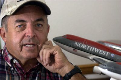 
Les McNamee, who retired from Northwest Airlines in 2001, is surrounded by models of planes he flew during his 32-year career. McNamee draws an annual pension of $94,000, but whether McNamee and thousands of other employees and retirees of Eagan, Minn.-based Northwest Airlines Corp. get the pension checks they'd been led to expect was thrown into question when the two carriers filed for Chapter 11 bankruptcy. 
 (Associated Press / The Spokesman-Review)