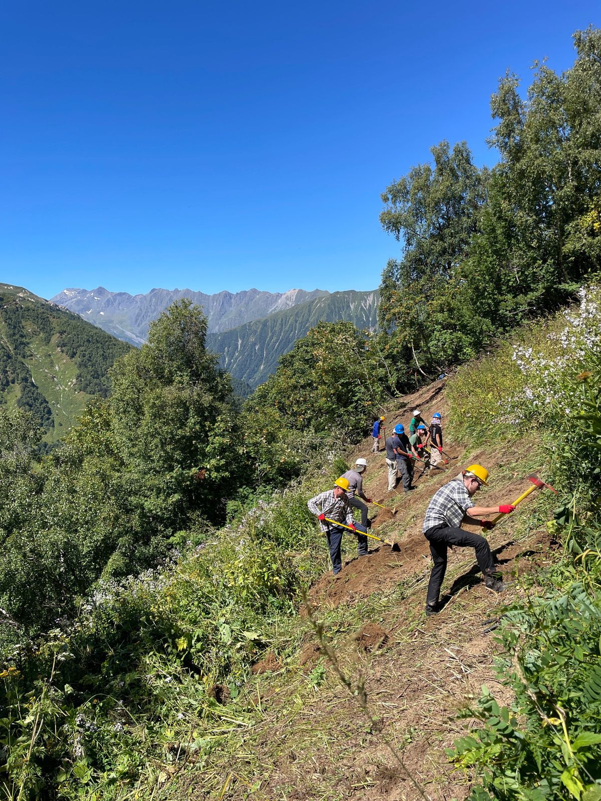 In an undated image provided by Matt Schultz, international volunteers work to maintain the 1,750-kilometer Transcaucasian Trail, which links Azerbaijan, Armenia and Georgia. The burgeoning volunteer tourism sector lets travelers help maintain the natural beauty of the places they explore, from Patagonia to the Caucasus. (Matt Schultz via The New York Times) – NO SALES; FOR EDITORIAL USE ONLY WITH NYT STORY VOLUNTEER TOURISM BY CORAL MURPHY MARCOS FOR MAY 13, 2025. ALL OTHER USE PROHIBITED. – (MATT SCHULTZ)