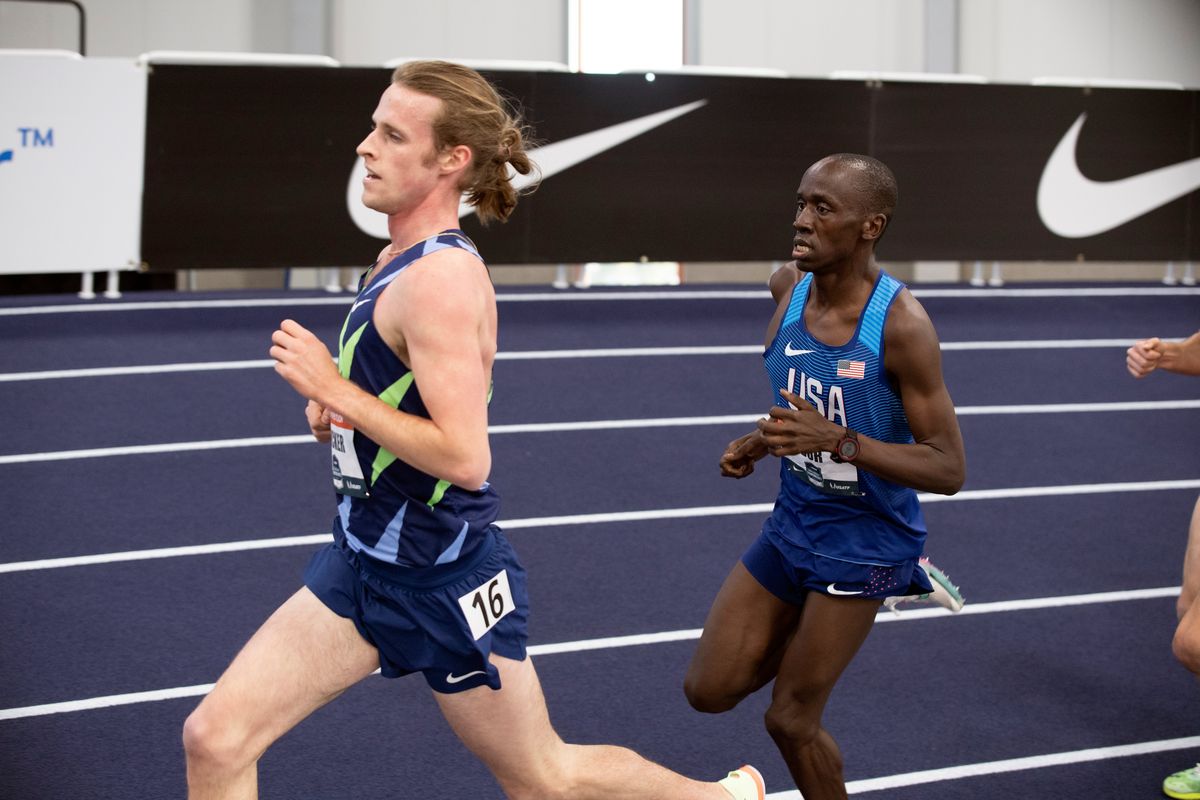 Cole Hocker, left, edges Emannuel Bor to win the men’s 3,000-meter run at the USATF National Championships at the Podium on Feb. 27.  (Jesse Tinsley/The Spokesman-Review)