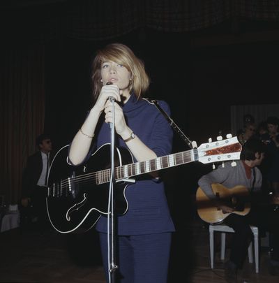 French singer and songwriter Françoise Hardy performs at the Savoy Hotel in London, circa 1967.    (Keystone/Getty Images of North America/TNS)