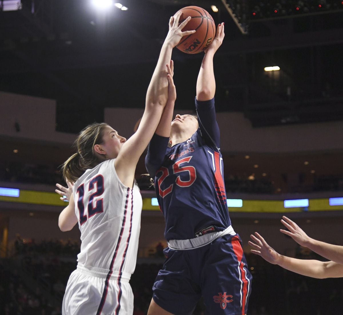 In this March 7, 2017 file photo, Gonzaga center Emma Wolfram (12) puts a stop on Saint Marys forward Megan McKay in their WCC title game at Orleans Arena in Las Vegas. (Dan Pelle / The Spokesman-Review)