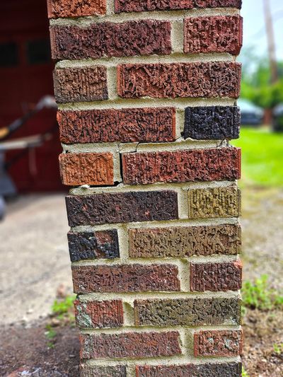 This crack in a small brick pier indicates a semi-serious structural problem. Don’t ignore things like this.  (Tribune Content Agency)