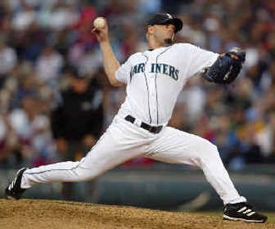 
Seattle's Joel Pineiro was solid, but didn't get win. 
 (Associated Press / The Spokesman-Review)