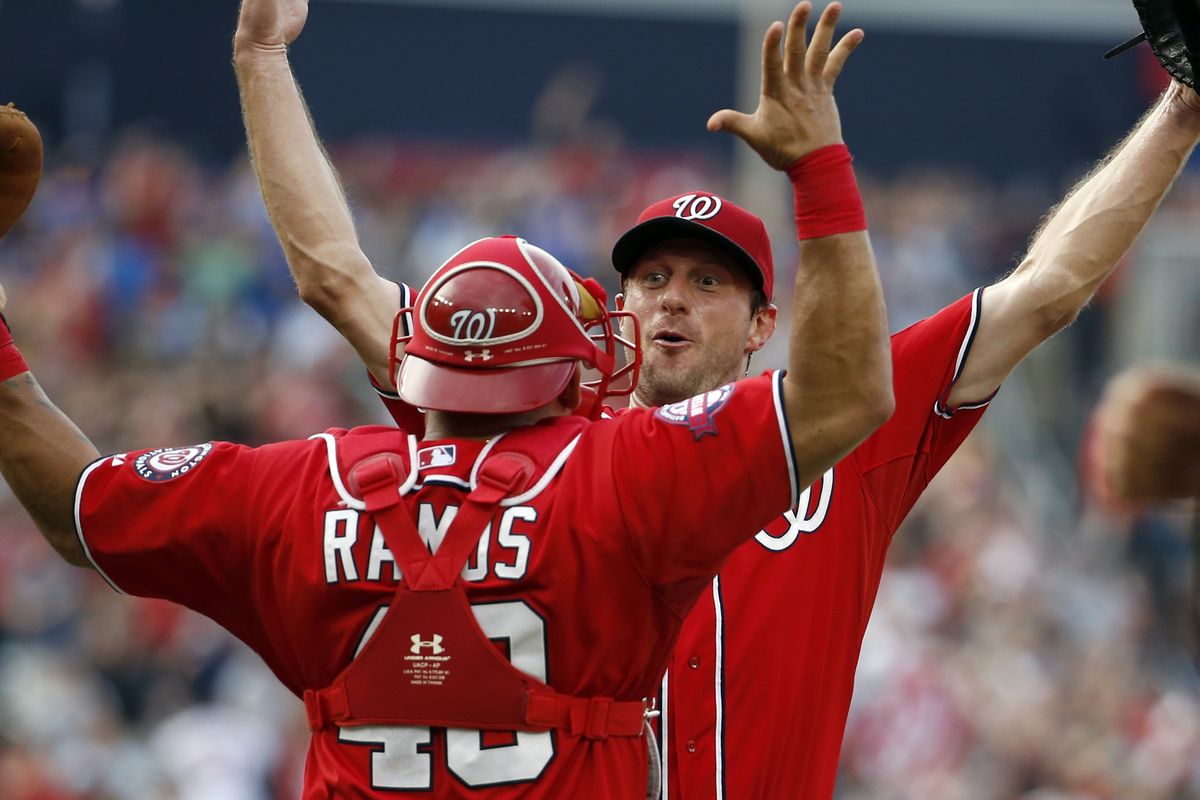 Nationals’ Max Scherzer prepares to hug catcher Wilson Ramos after keeping Pirates in check for his first ho-hitter. (Associated Press)