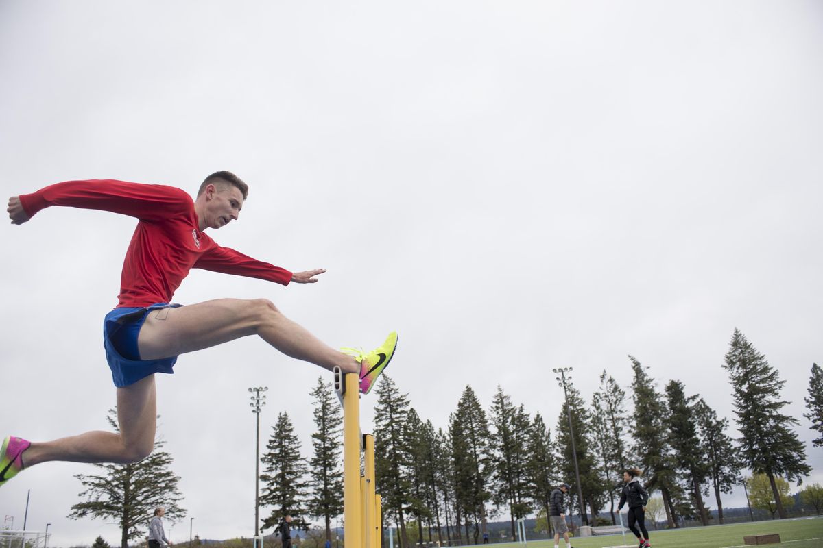 Troy Fraley, a track athlete at Gonzaga University, works out on hurdles at Spokane Falls Community College on Tuesday, May 16, 2017. Fraley holds the top NCAA time this year in the steeplechase. (Jesse Tinsley / The Spokesman-Review)