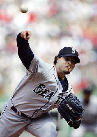 
Seattle's Joel Pineiro got past a shaky start in second inning.
 (Associated Press / The Spokesman-Review)