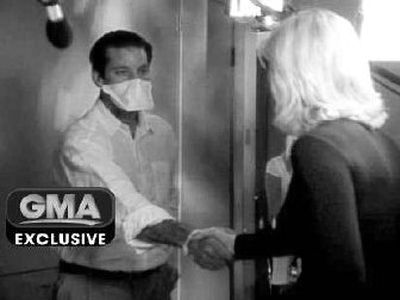 
In this image  from video  released by ABC, tuberculosis patient Andrew Speaker  greets 