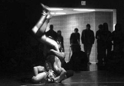 CV's Tanner Teeples goes upside down versus Davis' Zach Nalley.
(Jed Conklin / The Spokesman-Review)