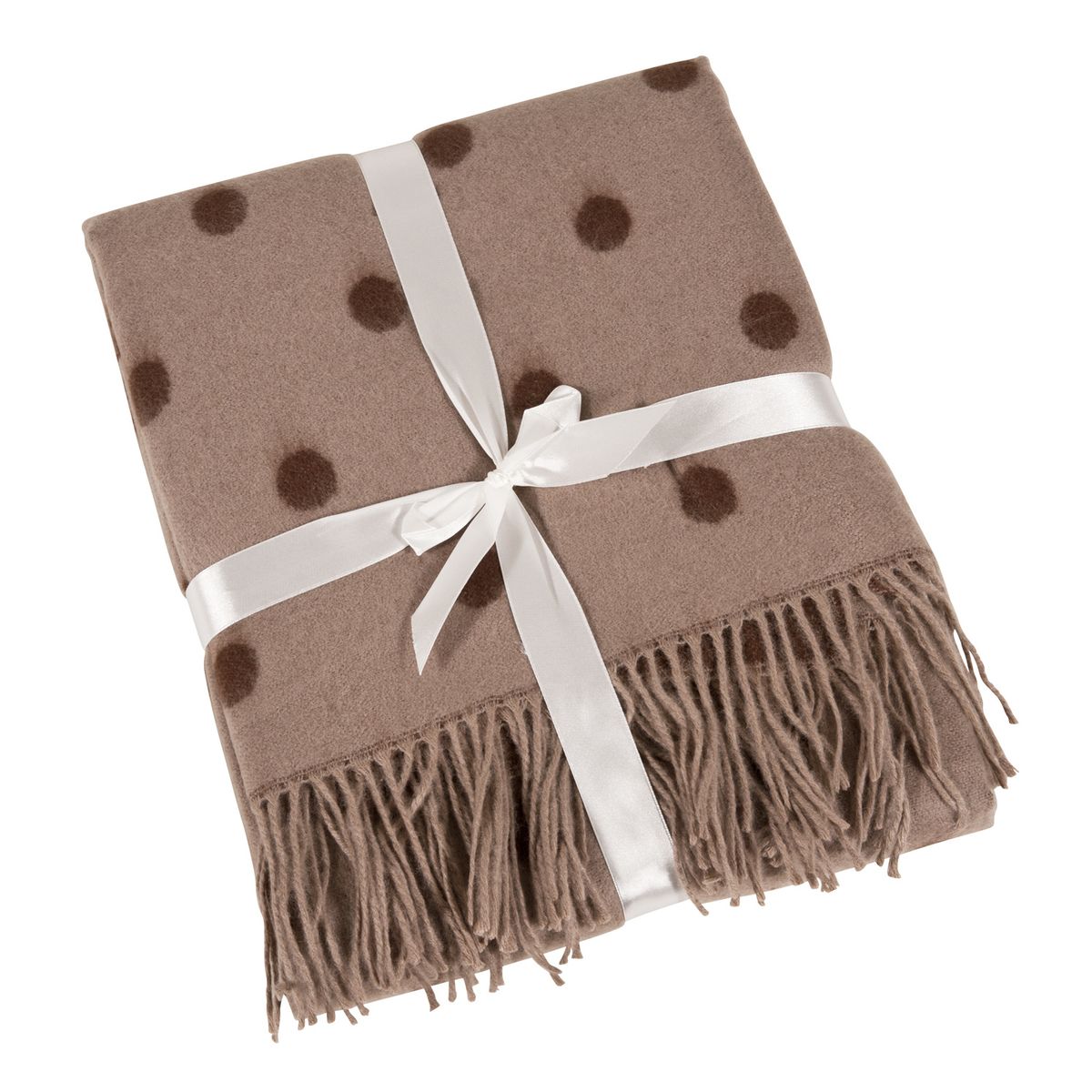 This photo from Overstock.com shows a warm-toned beige cozy throw with brown polka dots. Throws make soft, supple and warm additions to fall and winter décor. (Associated Press)