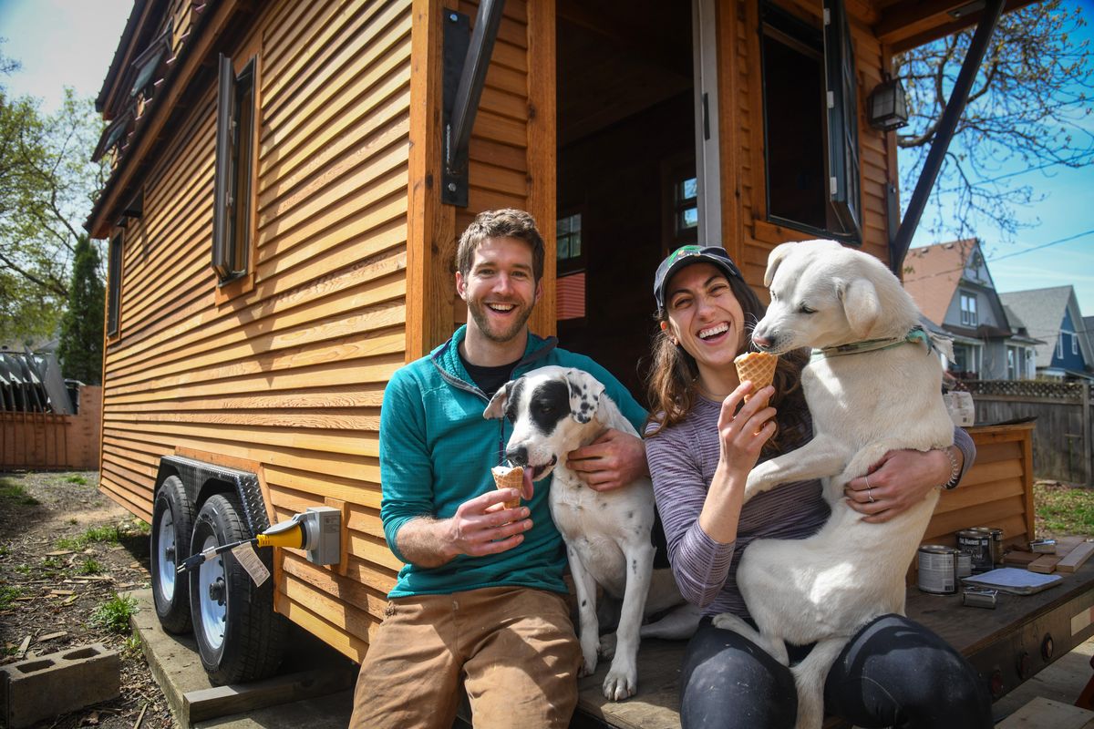 Henry Hagood and Grouper, along with Mallory Koula and Wizard, will be taking their tiny home to Montana. (Dan Pelle / The Spokesman-Review)