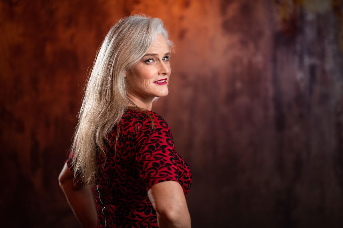 Susan Esco, 50, vowed to live dye-free with her hair when she turned 44, so she went through a transformation that included cutting her hair short. About one year ago, she decided to help other women embracing the silver mane and founded the Facebook group Shine on Silver Sisters and #DYEFree2BMe on Twitter. (Colin Mulvany / The Spokesman-Review)