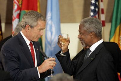 
President Bush raises a toast to United Nations Secretary-General Kofi Annan at United Nations headquarters. Bush and Iranian President Mahmoud Ahmadinejad spoke to the assembly Tuesday. 
 (Associated Press / The Spokesman-Review)