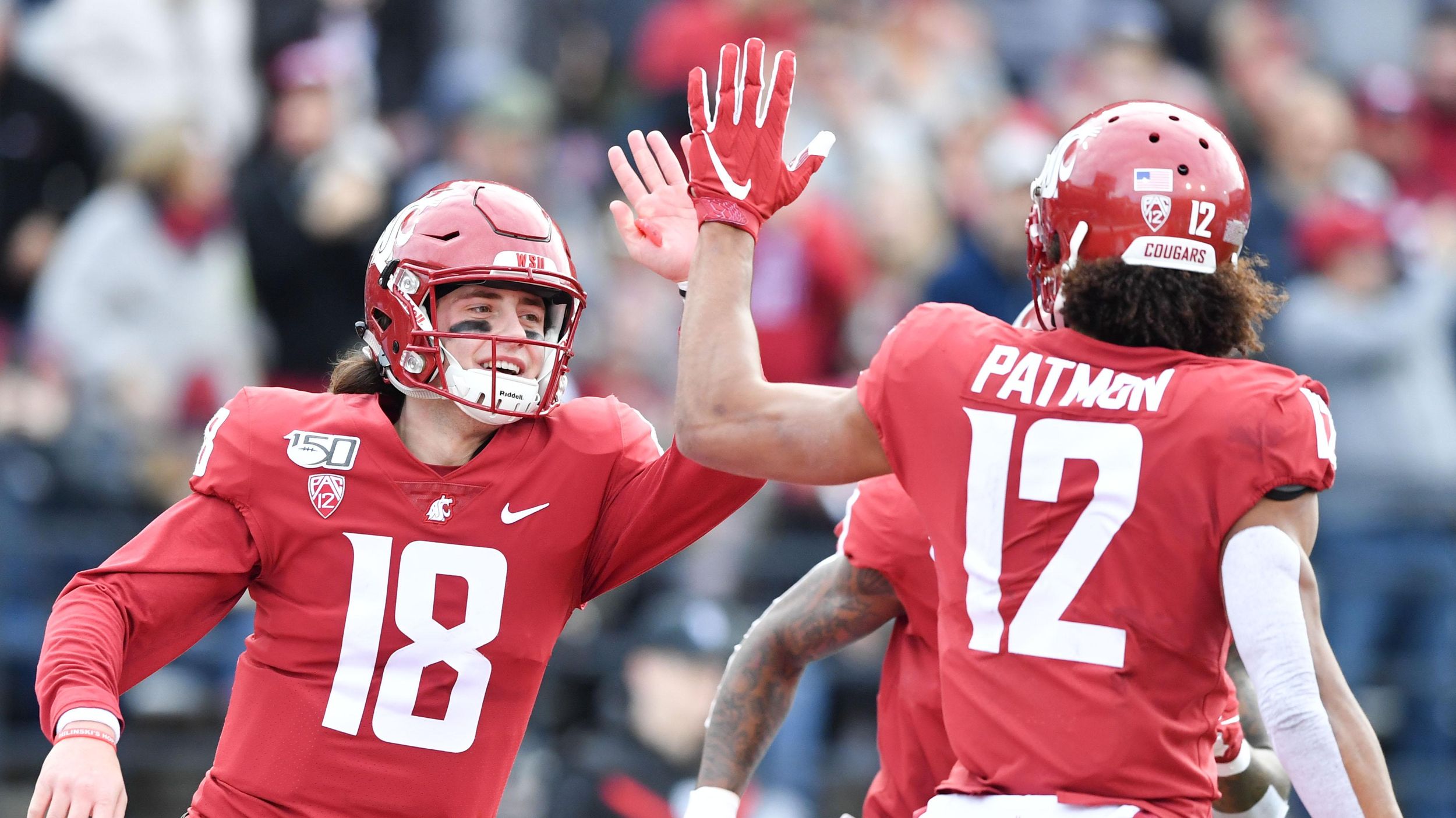 Anthony Gordon of the Washington State Cougars looks to throw the  Washington  state football, College football uniforms, Washington state cougars