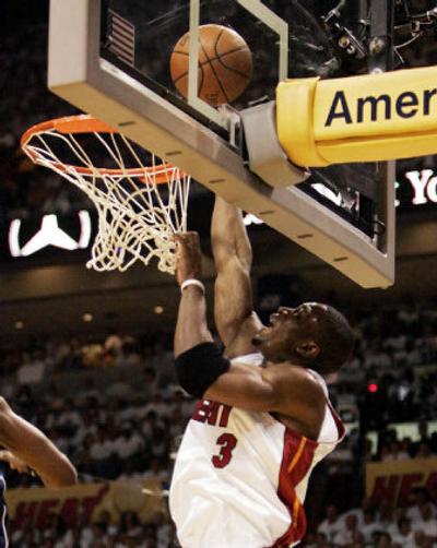
Heat guard Dwyane Wade tied his career playoff high by scoring 42 points in Game 3 at Miami Tuesday night. 
 (Associated Press / The Spokesman-Review)