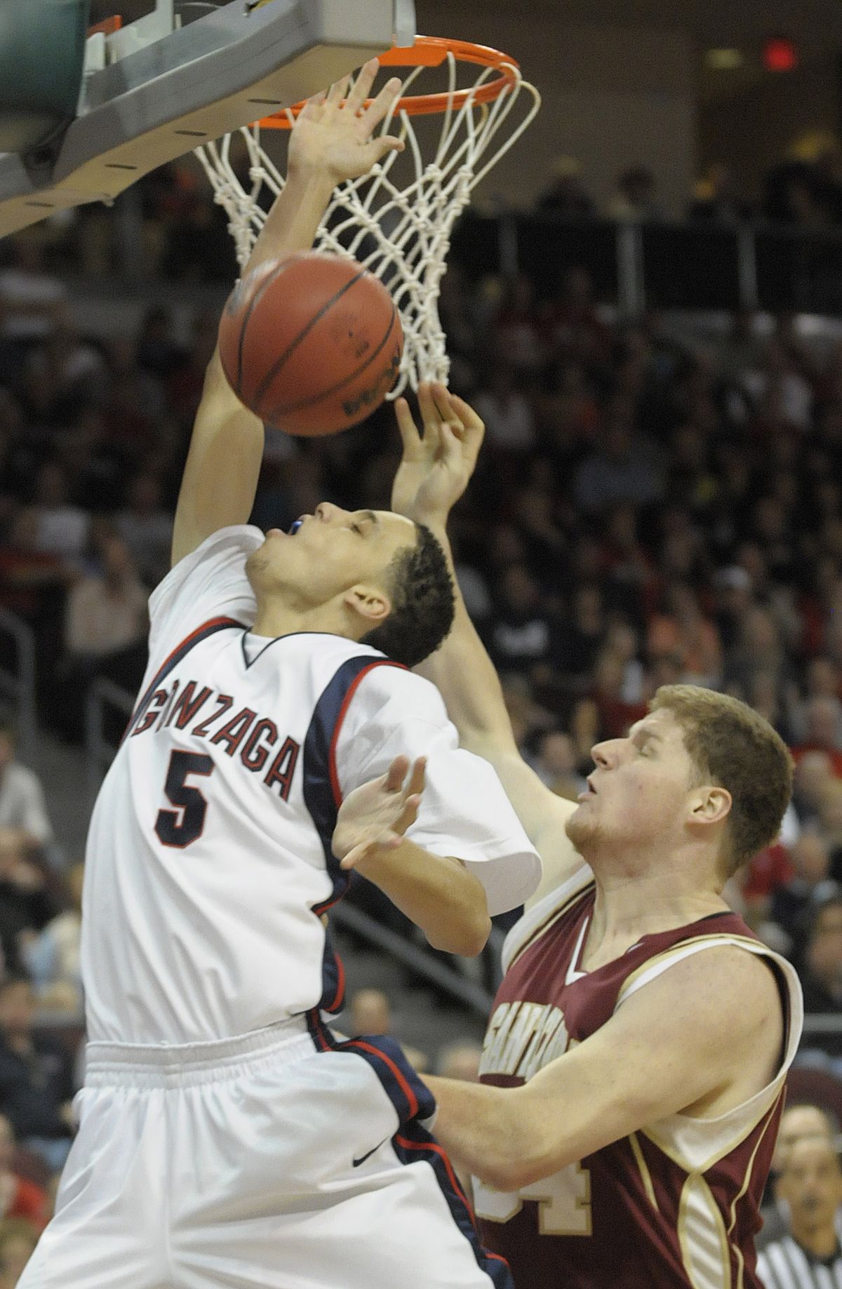 Austin Daye of Gonzaga is fouled as he goes strong to the basket against John Bryant of Santa Clara on Sunday, March 8, 2009, during their semifinal game in the WCC Tournament in Las Vegas. Gonzaga advanced to the championship game Monday night.   (Christopher Anderson / The Spokesman-Review)