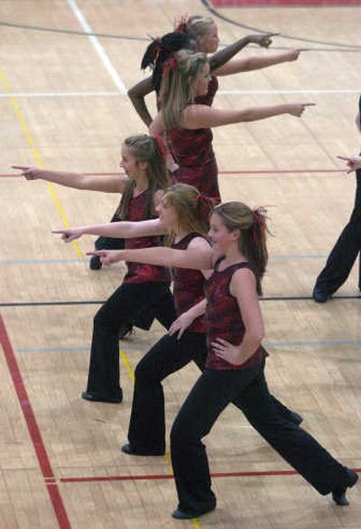 
The North Central High School Red Feathers Dance Team performs at a student assembly Sept. 7.
 (Dan Pelle / The Spokesman-Review)