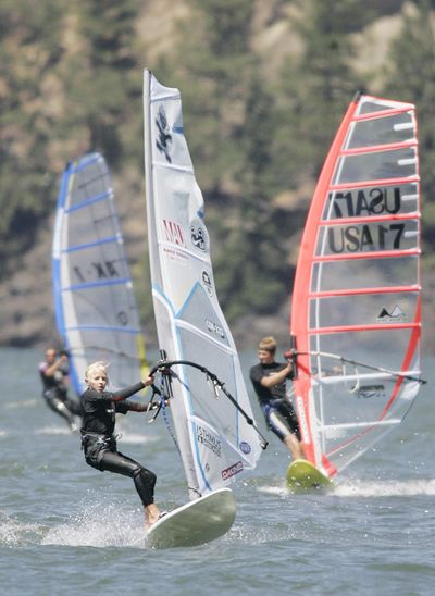 Wind surfers enjoy a day in Hood River, Ore. A developer’s plans to build a waterfront hotel, commercial building and wakeboarding park have drawn opposition from environmental groups. (Associated Press)