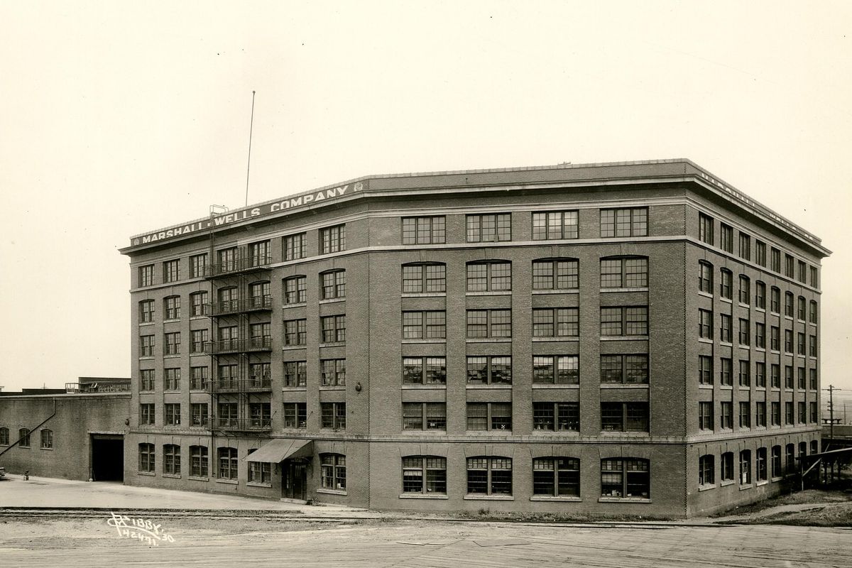 1930 historical photo of the Jensen-Byrd warehouse building, when Marshall-Wells, a hardware distributor, occupied the 1908 building. (Charles Libby / Northwest Museum of Arts & Culture/Eastern Washington State Historical Society)