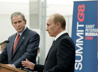 
Russian President Vladimir Putin, right, holds court during a joint news conference with Bush. 
 (Associated Press / The Spokesman-Review)