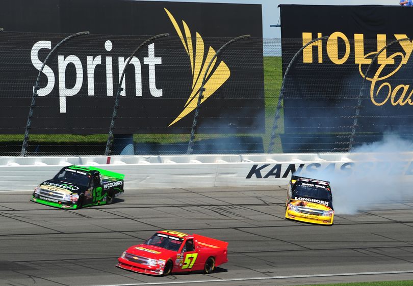 Ron Hornaday Jr. (No. 33) makes contact with Johnny Sauter and both slide in Turn 4 with 10 laps to go in the NASCAR Camping World Truck Series O'Reilly Auto Parts 250 at Kansas Speedway on May 2, 2010 in Kansas City, Kan. (Courtesy of Rick Dole/Getty Images) (Rick Dole / Getty Images North America)