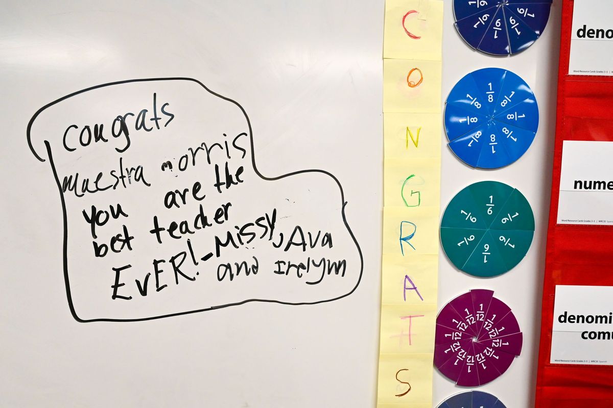 Spanish Immersion Language School students leaves a message for their teacher Jennifer Morris on the white board at the Libby Center, Monday, Dec. 11, 2023, in Spokane.  (DAN PELLE/THE SPOKESMAN-REVIEW)