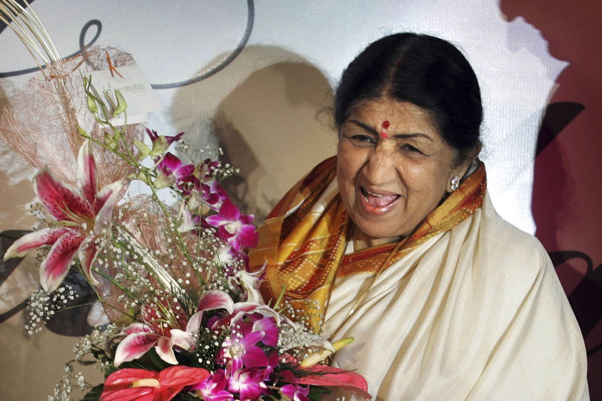 Singer Lata Mangeshkar laughs at the launch of her hindi music album