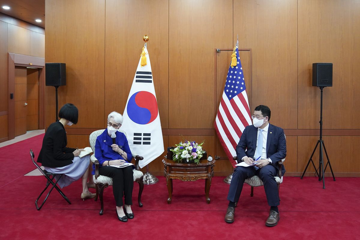 In this photo provided by South Korea Foreign Ministry, U.S. Deputy Secretary of State Wendy Sherman, second from left, talks to journalists as South Korean First Vice Foreign Minister Choi Jong Kun listens after their meeting at the Foreign Ministry in Seoul, South Korea, Friday, July 23, 2021. America