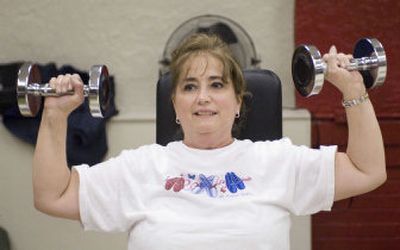 
Rita Frasher, a member of the Public Employees Insurance Agency weight loss program, workd out last month  in Gary, W.Va. 
 (Associated Press / The Spokesman-Review)