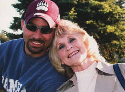 
Mary Glidden leans on her son-in-law, Marty Walker, at her grandson's T-ball game a few weeks before her death.
 (Photo courtesy of family / The Spokesman-Review)