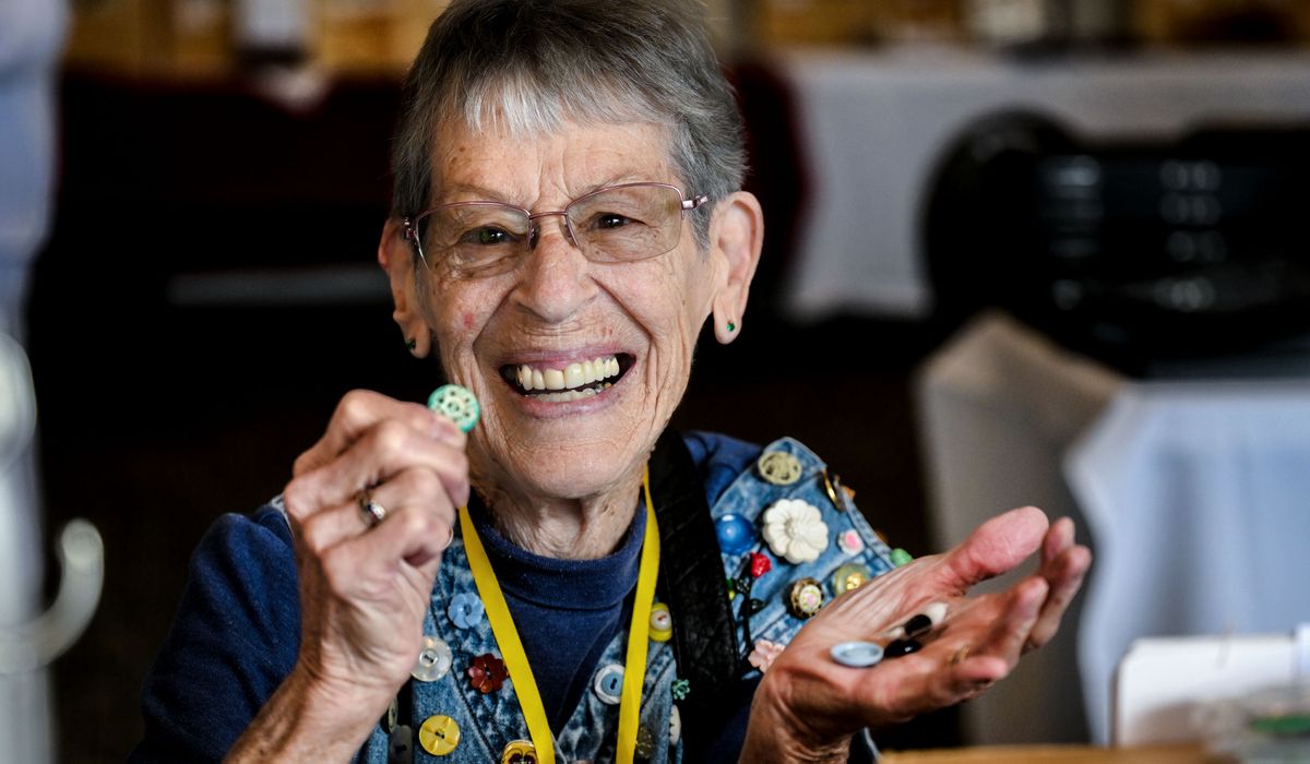 “We’re cuckoo when it comes to buttons,” says Betty McIntosh of Eden, Idaho, as she displays one of the unique buttons she found at the Idaho State Button Society gathering Friday at Red Lion Hotel Templin’s on the River in Post Falls. (Kathy Plonka/The Spokesman-Review)