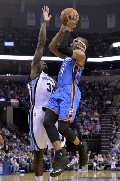 Memphis’ Jeff Green defends Oklahoma City’s Russell Westbrook. (Associated Press)