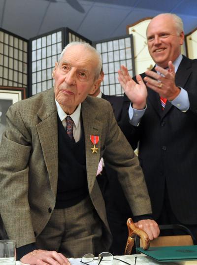 George Vujnovich, 95, of Queens, N.Y., is awarded the U.S. Bronze Star Medal on Sunday.  (Associated Press)