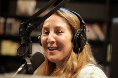 
Cheryl Waters talks on the air during her shift as a disc jockey at KEXP. The station's paying members include listeners in New York, Washington, D.C., San Francisco, Portland, Boston and Los Angeles.
 (The Spokesman-Review)