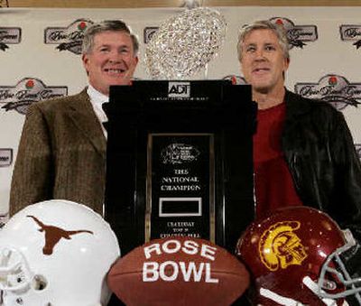 Texas coach Mack Brown, left, and USC coach Pete Carroll set to match wits.
 (Associated Press / The Spokesman-Review)