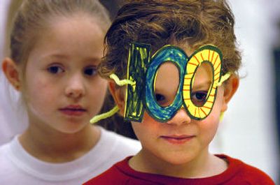 
Kindergartners Kyle Jones, right, and Natalie Key watch during the assembly. 
 (The Spokesman-Review)