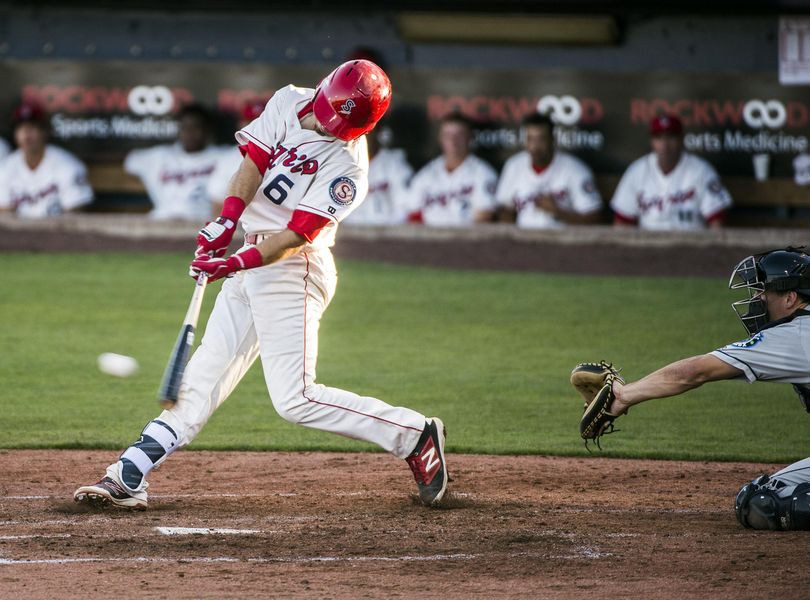 Spokane’s Seth Spivey rips a double in the fourth inning of a 9-3 victory over the Everett AquaSox at Avista Stadium on Wednesday. (Dan Pelle / The Spokesman-Review)