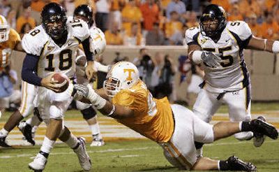 
Cal's quarterback Joe Ayoob (18) likely saw his team's hopes of a national title vanish in opener against Tennessee. 
 (Associated Press / The Spokesman-Review)