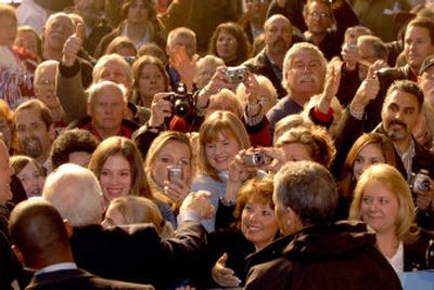 
Enthusiastic crowd members vie for a chance to shake hands with Vice President Dick Cheney, lower left,  at the Empire Aerospace hangar at the Coeur d'Alene Airport on  Nov. 2 at a rally to boost Republican state and federal candidates.
 (File Associated Press / The Spokesman-Review)