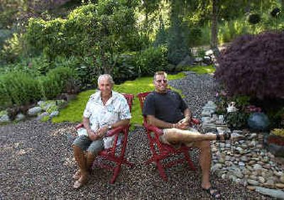 
Retired photographer Paul, left, and friend Richard built this garden complete with ponds, fountains and modern art. Their last names are withheld to maintain the garden's seclusion.
 (Brian Plonka / The Spokesman-Review)