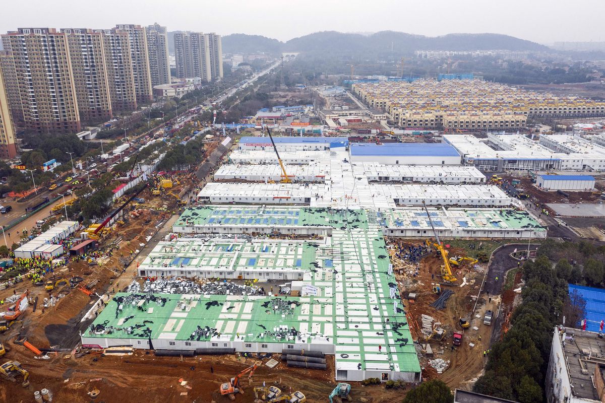 The Huoshenshan temporary field hospital under construction is seen as it nears completion in Wuhan in central China’s Hubei Province, on Sunday. (Associated Press)