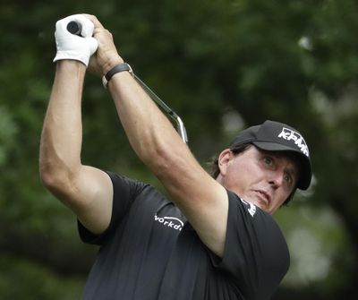 Phil Mickelson hits on the fourth tee during the third round for the Masters golf tournament Saturday, April 13, 2019, in Augusta, Ga. (Chris Carlson / Associated Press)