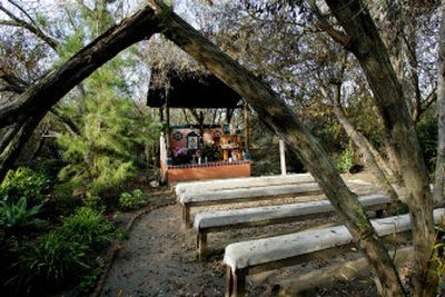 
 A makeshift chapel named Our Lady of Mount Carmel outside Del Mar, Calif., is the site of church services for migrants. 
 (Associated Press / The Spokesman-Review)