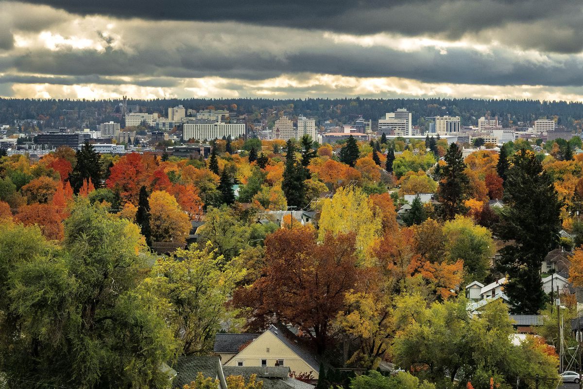 From the West Glass Avenue bluff, a rainbow of fall colors can be seen from this view looking south toward downtown Spokane, Wednesday, November 2, 2022.  (COLIN MULVANY/THE SPOKESMAN-REVI)