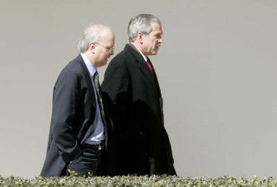
Karl Rove, White House deputy chief of staff, seen walking with President Bush in February, says last week's midterm election losses were largely due to the congressional page sex scandal. 
 (Associated Press / The Spokesman-Review)