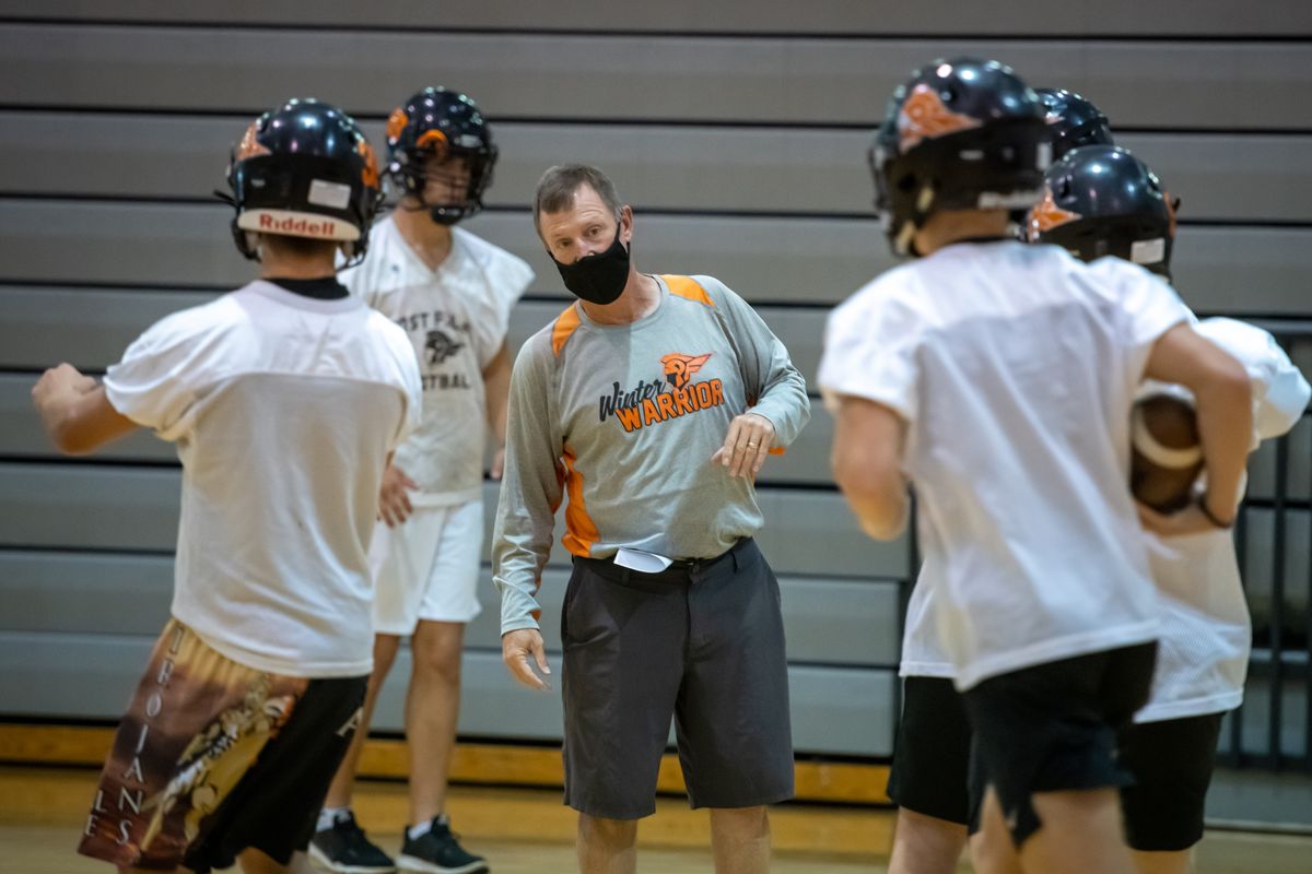 Post Falls High head football coach Blaine Bennett, 56, was once the head coach at Central Washington University and Western Oregon University, a quarterbacks coach at Purdue and the quarterback at Whitworth. He’s turned the Trojans into a winner.  (Colin Mulvany/THE SPOKESMAN-REVIEW)