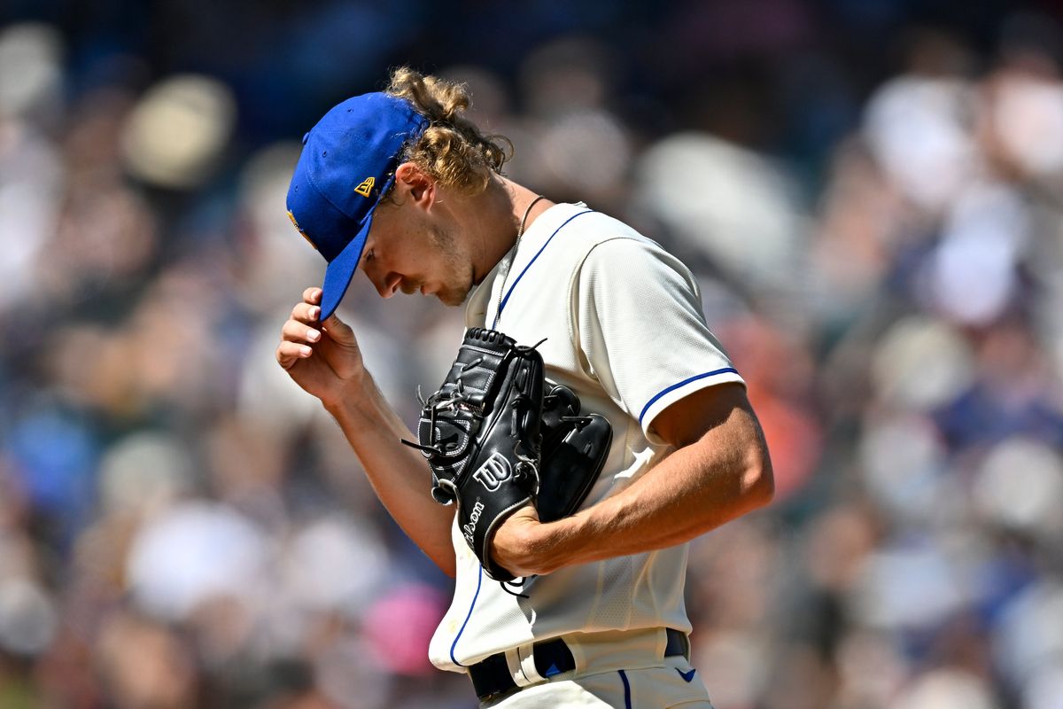 Seattle Mariners pitcher Bryce Miller adjusts his cap against the Baltimore Orioles on Sunday at T-Mobile Park in Seattle.   (Taylor Newquist / The Spokesman-Review)