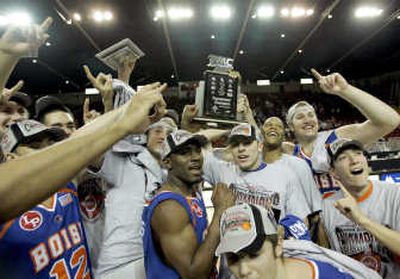 
Boise State players celebrate the WAC championship. Associated Press
 (Associated Press / The Spokesman-Review)