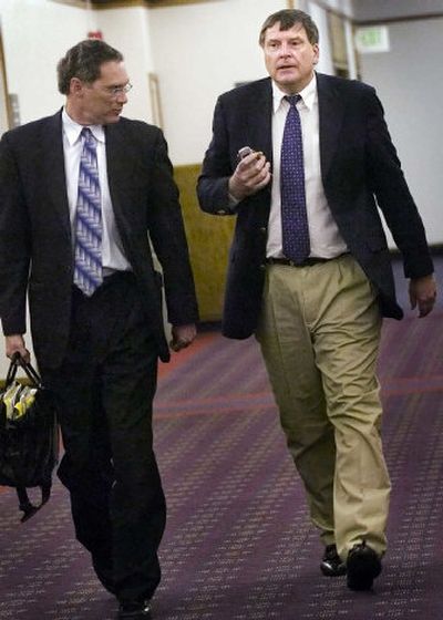 
Arlin R. Jordin, right, walks with his defense attorney, Bevan Maxey, to court on Wednesday afternoon. 
 (Holly Pickett / The Spokesman-Review)