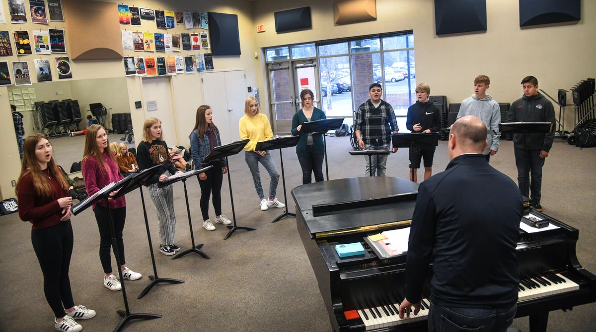 Mead High School Director of Choir, Mike Saccomanno, plays piano as members of the Mead Jazz Choir gather during class, Friday, Jan. 25, 2019. The choir was recently picked as one of eight (of 137) high school jazz groups to compete in April 2019 at the Monterey Next Generation Jazz Festival. (Dan Pelle / The Spokesman-Review)
