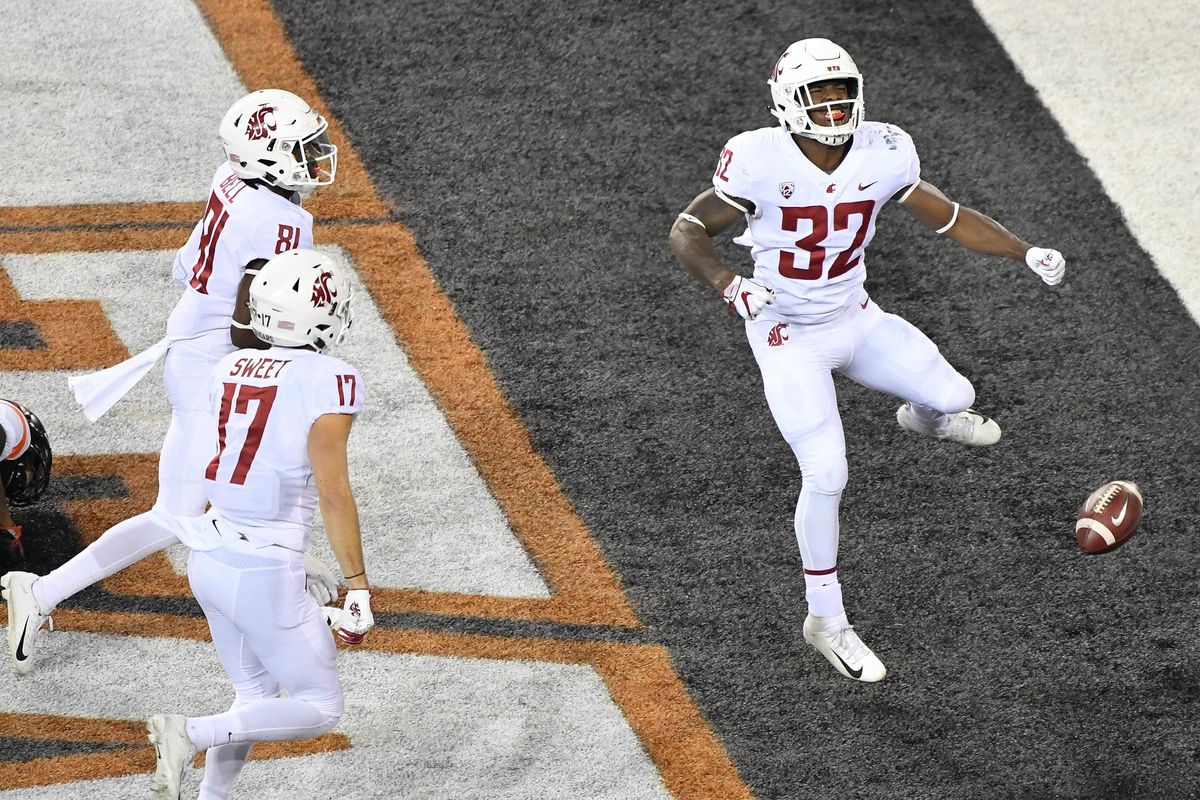 Washington State Cougars running back James Williams (32) celebrates after scoring a touchdown to close out the first half of a college football game against Oregon State on Saturday, October 6, 2018, Reser Stadium in Corvallis, Ore. (Tyler Tjomsland / The Spokesman-Review)